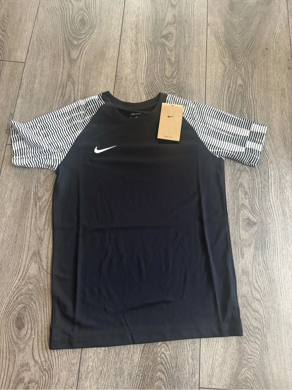 Nike Black Short-Sleeve Athletic Tee with Striped White Sleeves